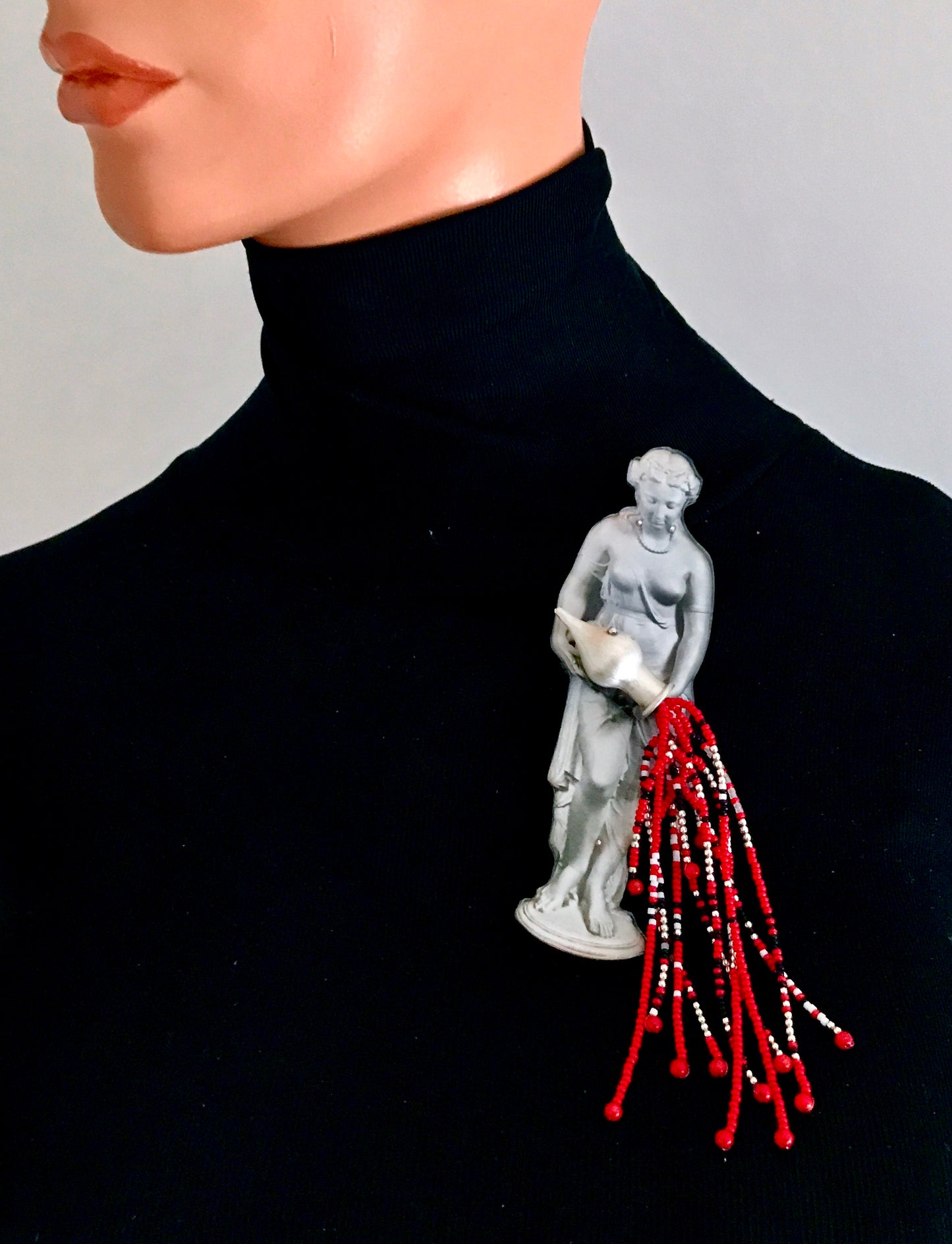Linda Savineau, "Black is Sorrow, White is Innocence, Red is Blood, Silver is Hope..."
